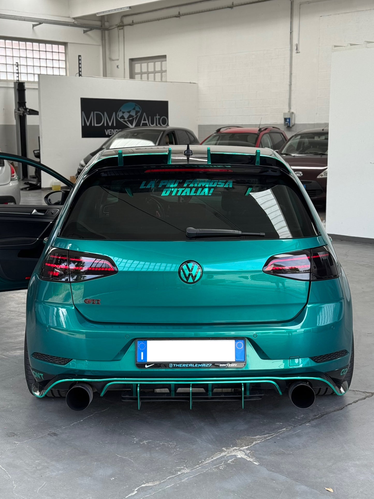 Riflettori Posteriori a Nido d'ape Nero Lucido per VW Golf 7.5